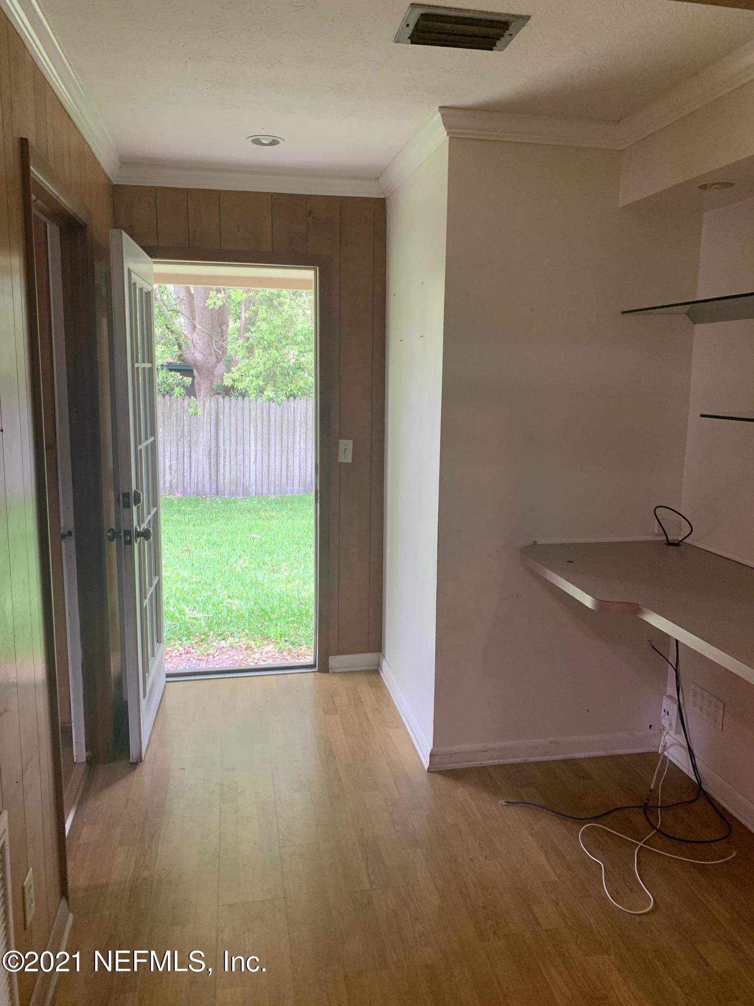4126 Dayrl Road Jacksonville, FL 32207 - Photo 18 of 26 a view of an empty room with a window