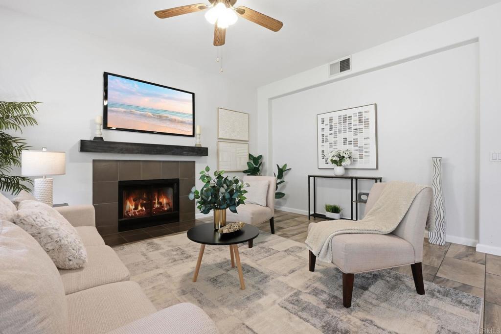 5051 Lake Circle Road Fallbrook, CA 92028 - Photo 9 of 50 a living room with furniture and a fireplace