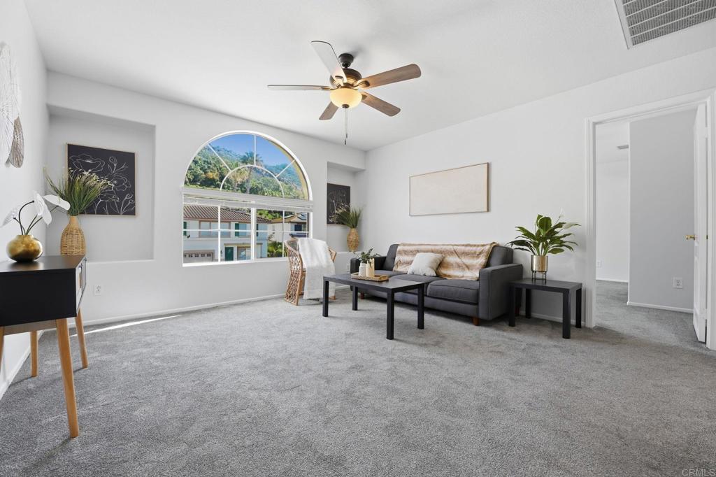 5051 Lake Circle Road Fallbrook, CA 92028 - Photo 17 of 50 a living room with furniture and windows