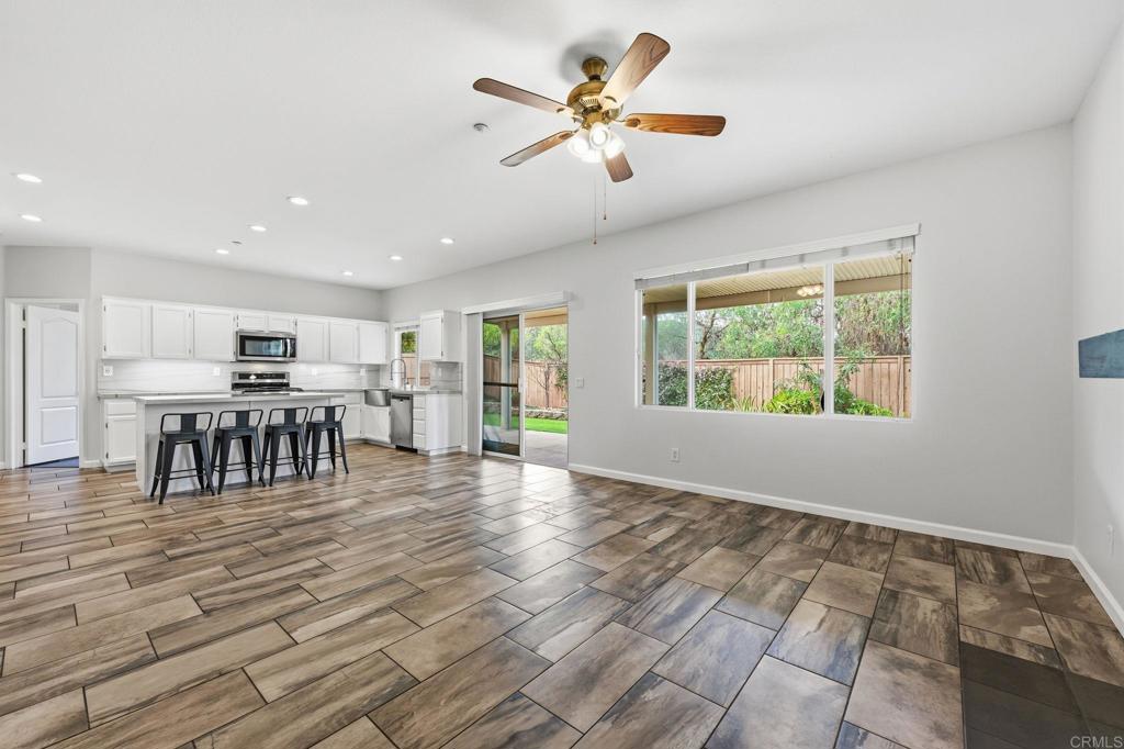 5051 Lake Circle Road Fallbrook, CA 92028 - Photo 20 of 57 a view of a workspace with furniture window and wooden floor