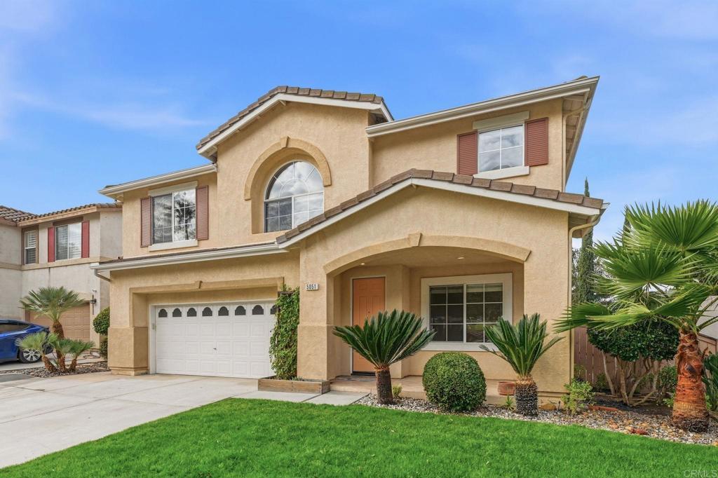 5051 Lake Circle Road Fallbrook, CA 92028 - Photo 2 of 57 a front view of a house with garden