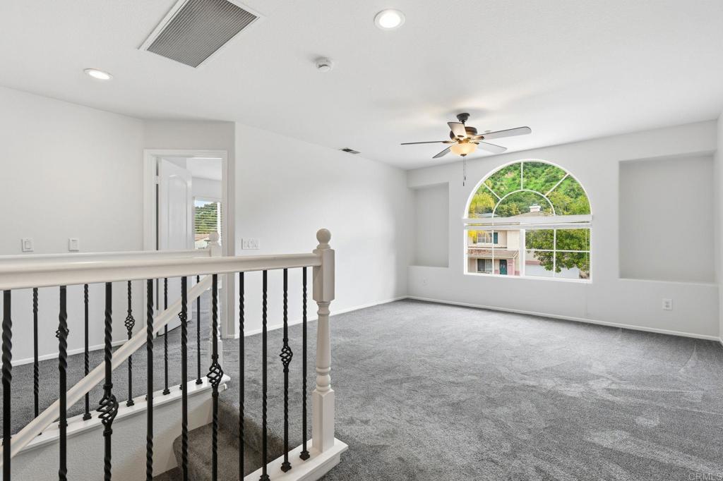 5051 Lake Circle Road Fallbrook, CA 92028 - Photo 24 of 57 a view of an empty room with a window