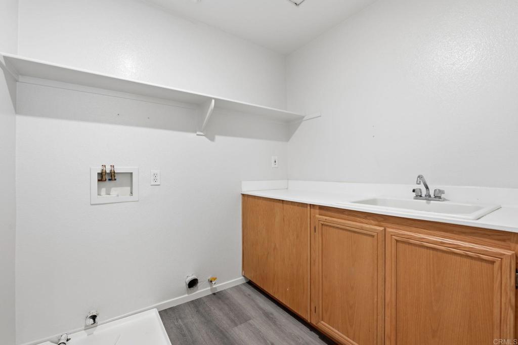 5051 Lake Circle Road Fallbrook, CA 92028 - Photo 22 of 50 a bathroom with a sink and a mirror