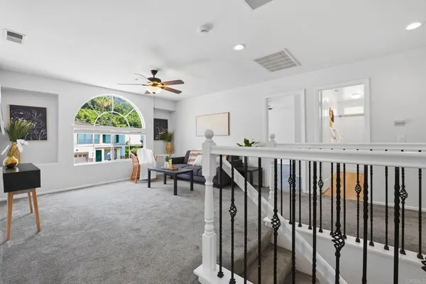a view of a livingroom with furniture window and outside view