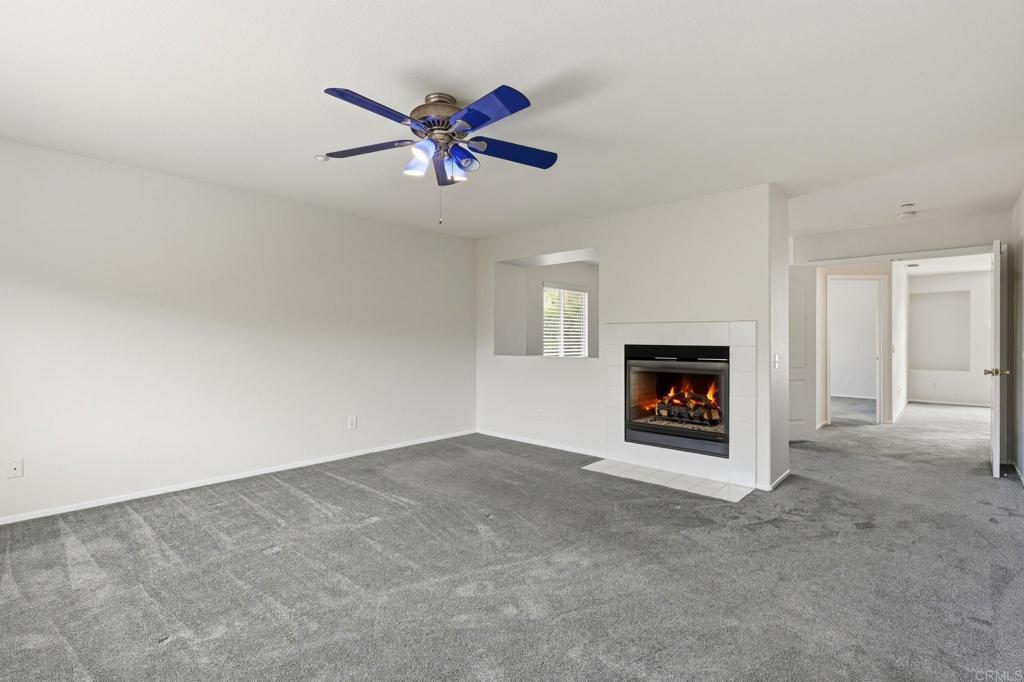 5051 Lake Circle Road Fallbrook, CA 92028 - Photo 32 of 57 a view of an empty room with a fireplace