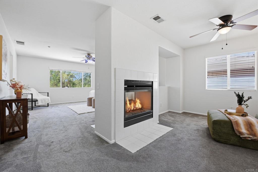 5051 Lake Circle Road Fallbrook, CA 92028 - Photo 30 of 50 a living room with furniture and a fireplace