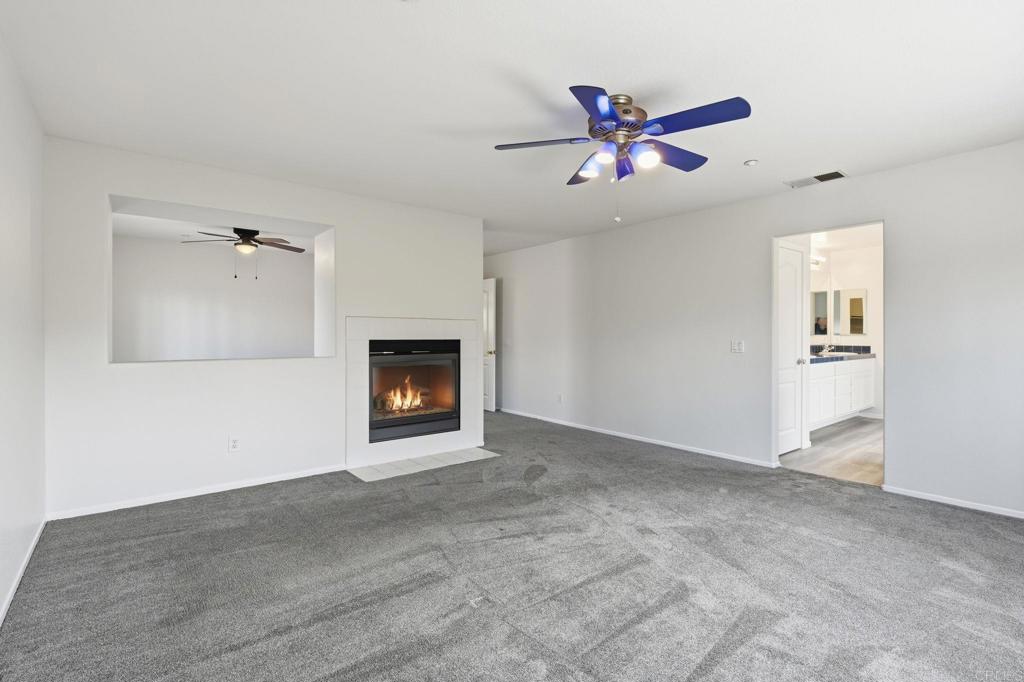 5051 Lake Circle Road Fallbrook, CA 92028 - Photo 33 of 57 Primary Bedroom with Fireplace!