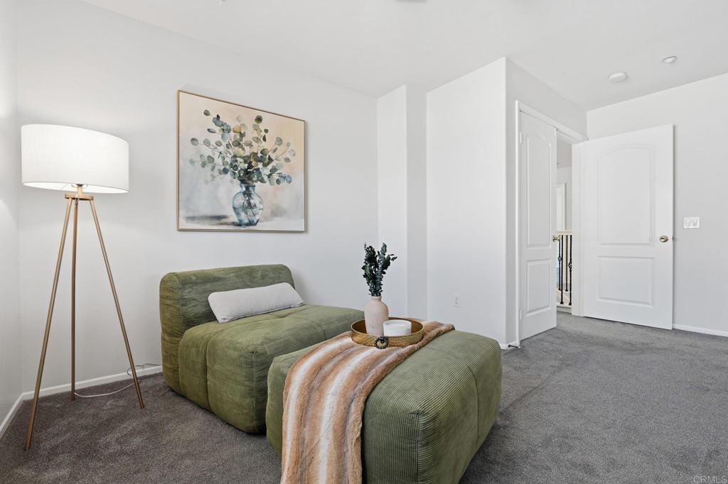 5051 Lake Circle Road Fallbrook, CA 92028 - Photo 31 of 50 a bedroom with a bed and a lamp