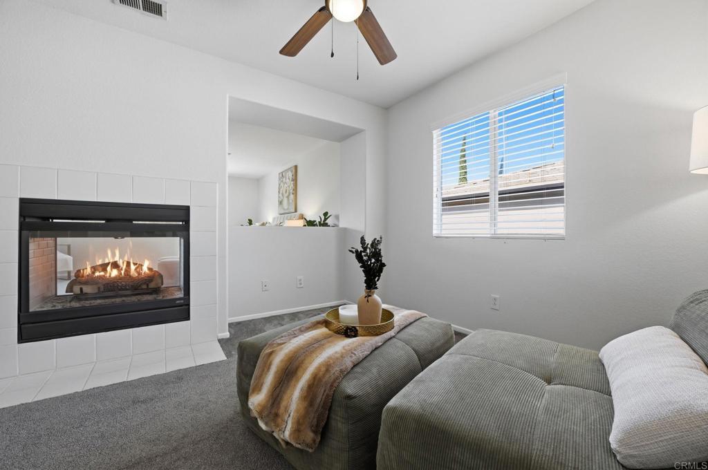 5051 Lake Circle Road Fallbrook, CA 92028 - Photo 32 of 50 a bedroom with a bed and a painting on the wall