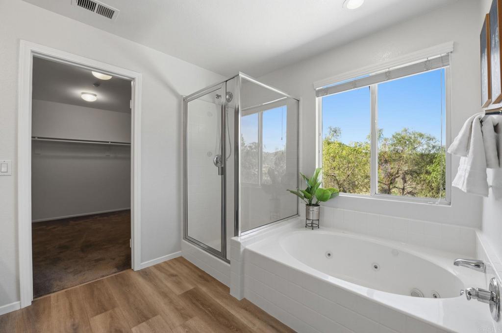 5051 Lake Circle Road Fallbrook, CA 92028 - Photo 34 of 50 a bathroom with a bathtub and a shower