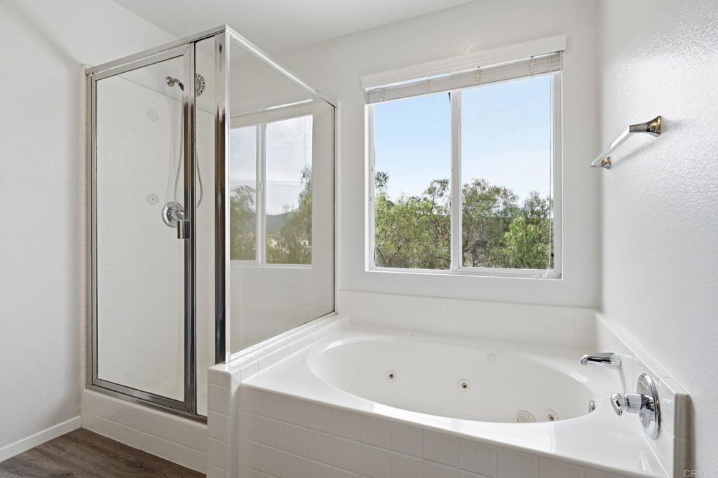 5051 Lake Circle Road Fallbrook, CA 92028 - Photo 39 of 57 a bathroom with a bathtub and shower