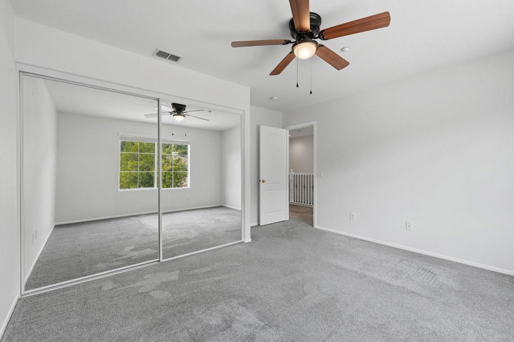 5051 Lake Circle Road Fallbrook, CA 92028 - Photo 42 of 57 a view of an empty room with a window