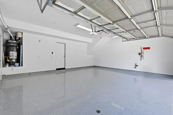 a view of an empty room with a windows