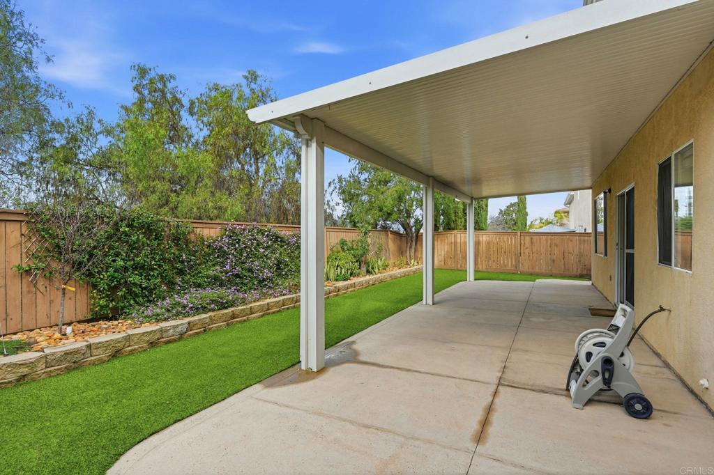 5051 Lake Circle Road Fallbrook, CA 92028 - Photo 46 of 50 a view of a backyard with plants and a patio