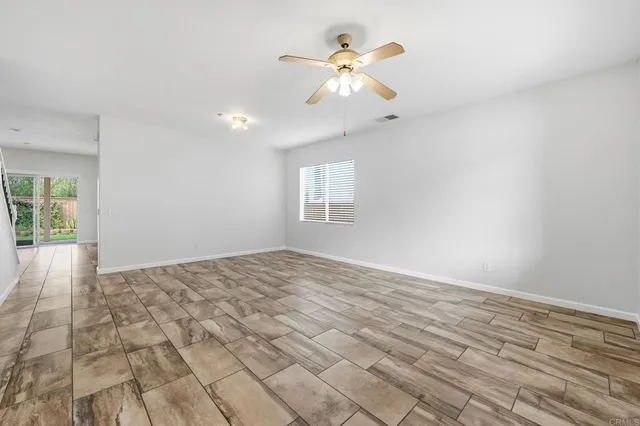 a kitchen with stainless steel appliances a refrigerator sink and stove