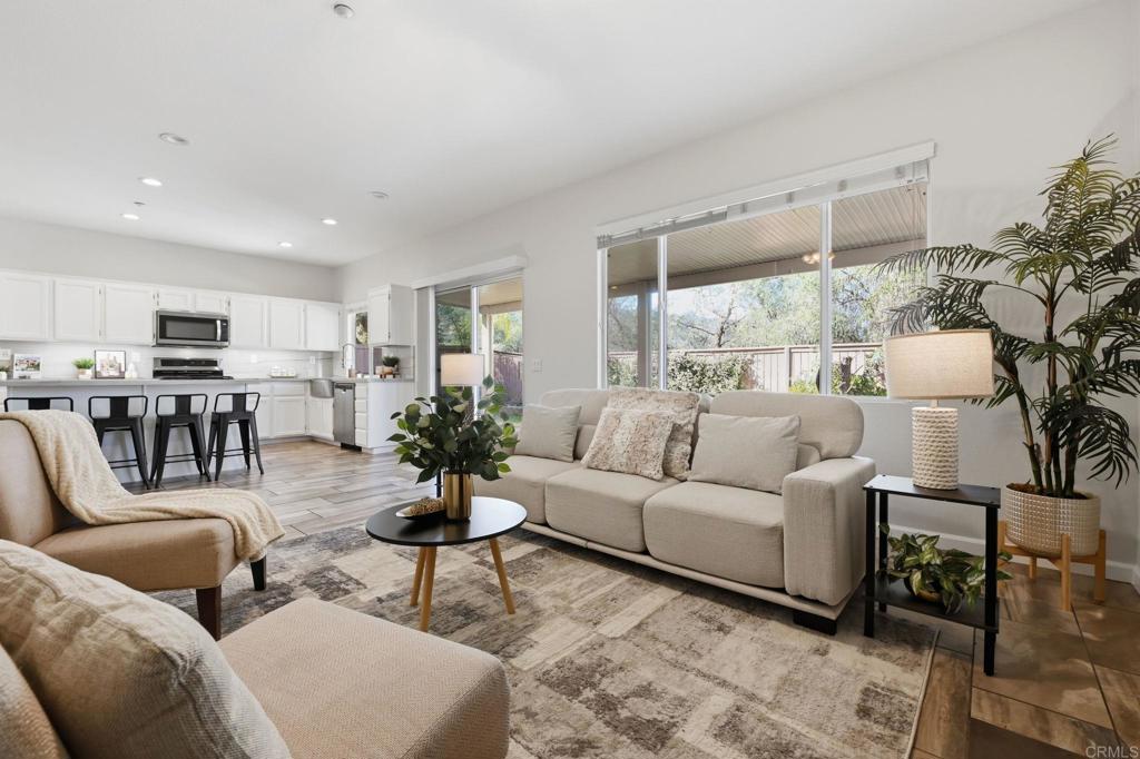 5051 Lake Circle Road Fallbrook, CA 92028 - Photo 7 of 50 a living room with furniture and kitchen view