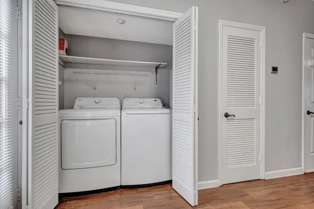 a utility room with dryer and washer