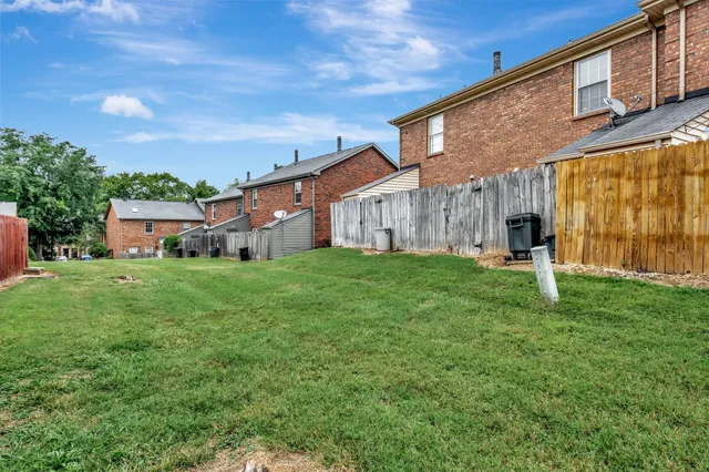 a house view with a garden space