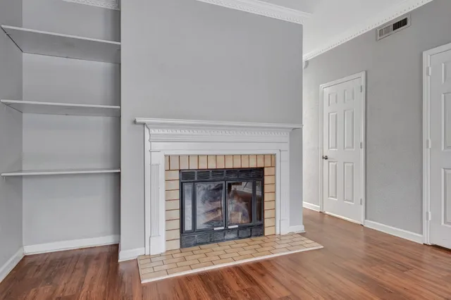 a living room with a fireplace
