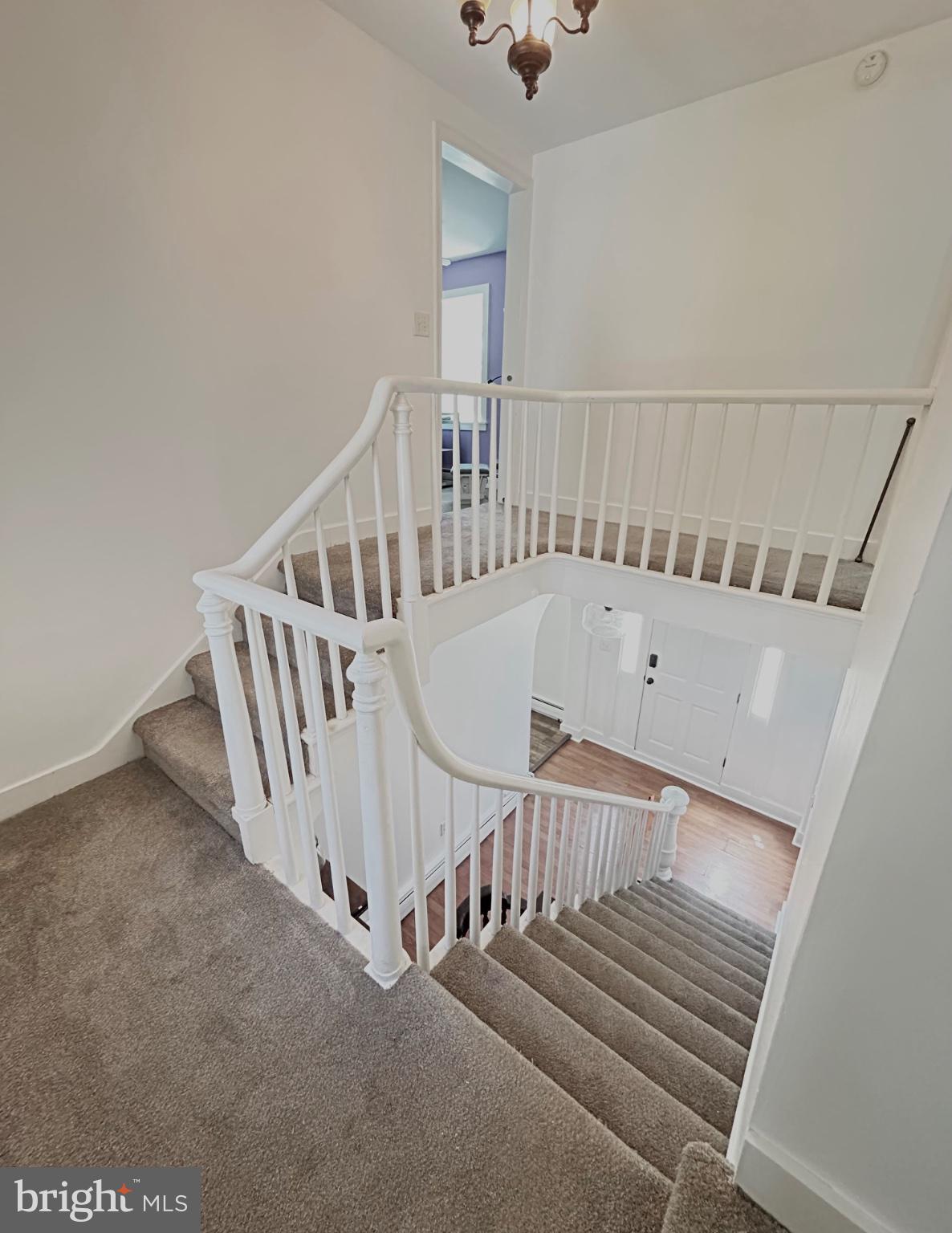 29292 Maple Avenue Trappe, MD 21673 - Photo 12 of 26 Elegant staircase with bright ambiance.