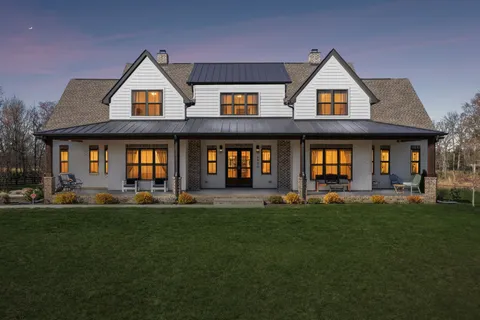 front view of a house with a yard