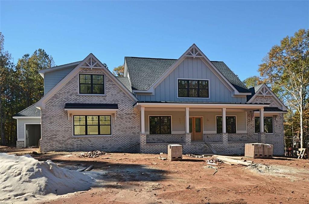 1216 Rays River Run Bogart, GA 30622 - Photo 2 of 25 a front view of a house with yard