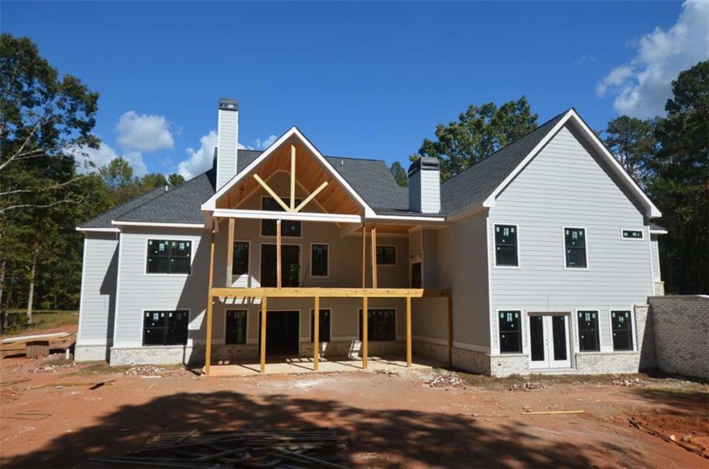 1216 Rays River Run Bogart, GA 30622 - Photo 22 of 25 a front view of a house with a yard