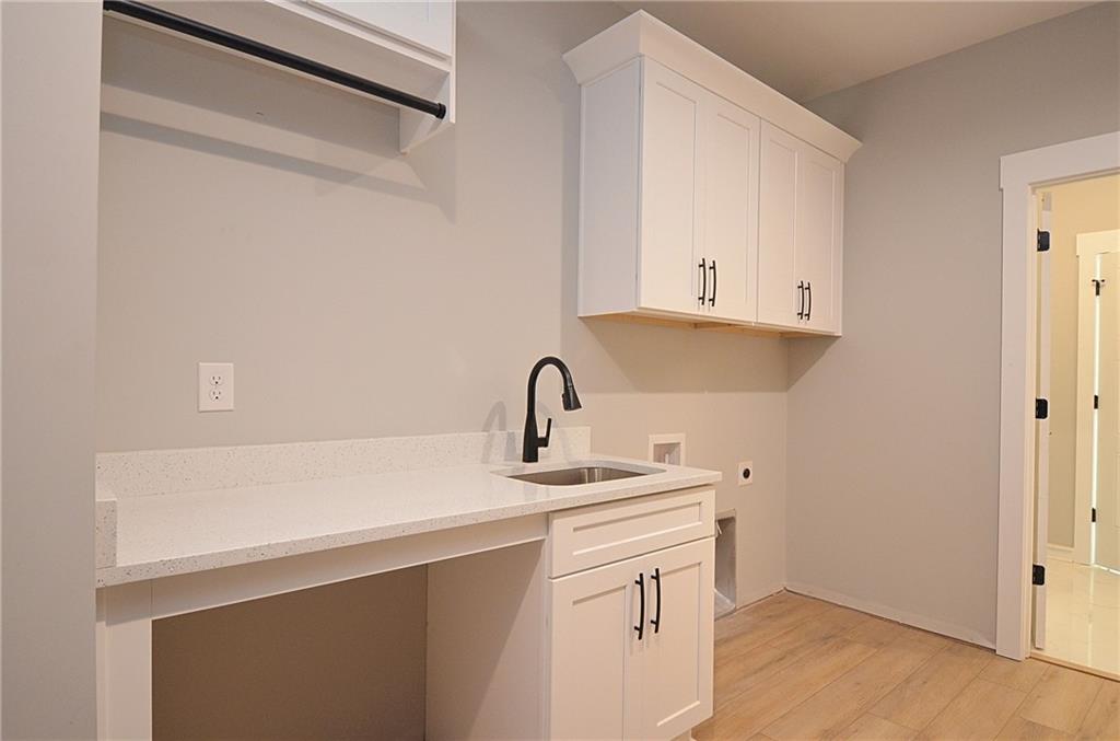 1216 Rays River Run Bogart, GA 30622 - Photo 10 of 25 a view of cabinets and sink