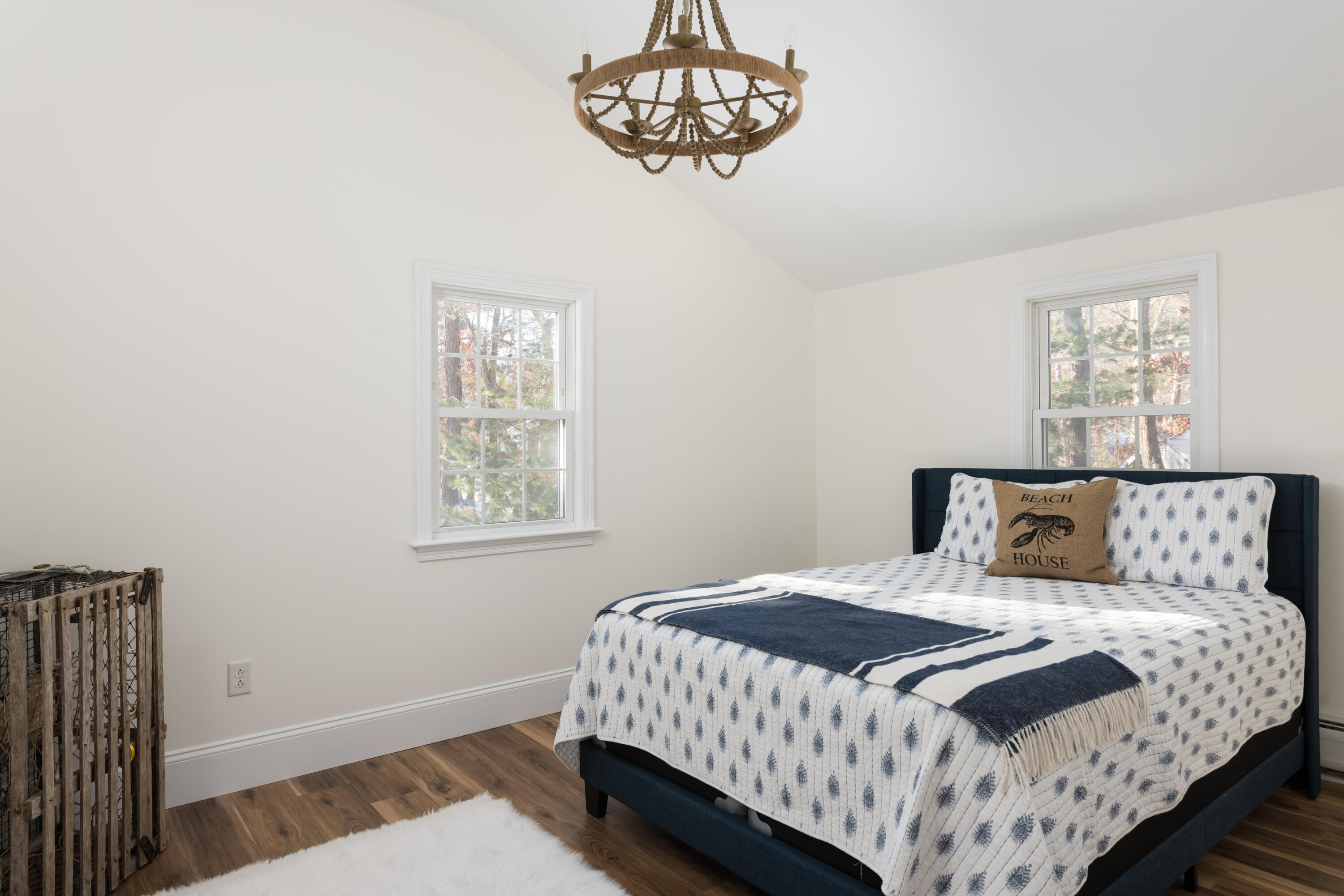 3 Neshobe Road Mashpee, MA 02649 - Photo 23 of 36 a bedroom with a bed and a window