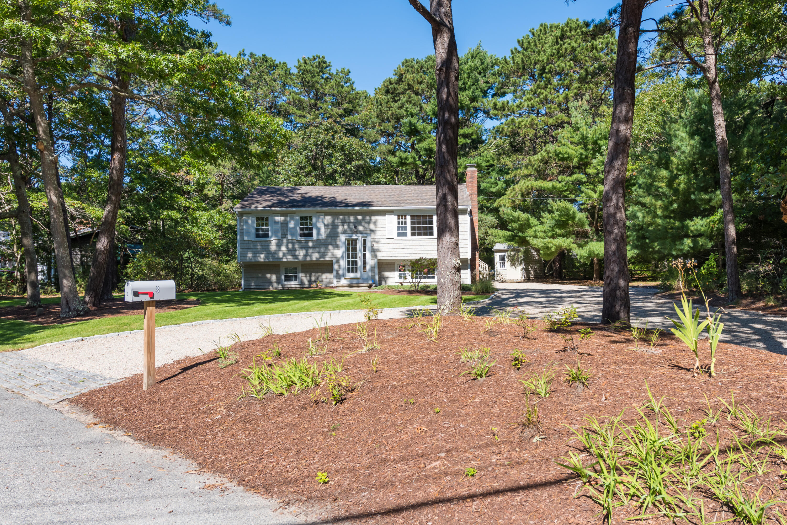 3 Neshobe Road Mashpee, MA 02649 - Photo 3 of 36 a view of a house with basketball court
