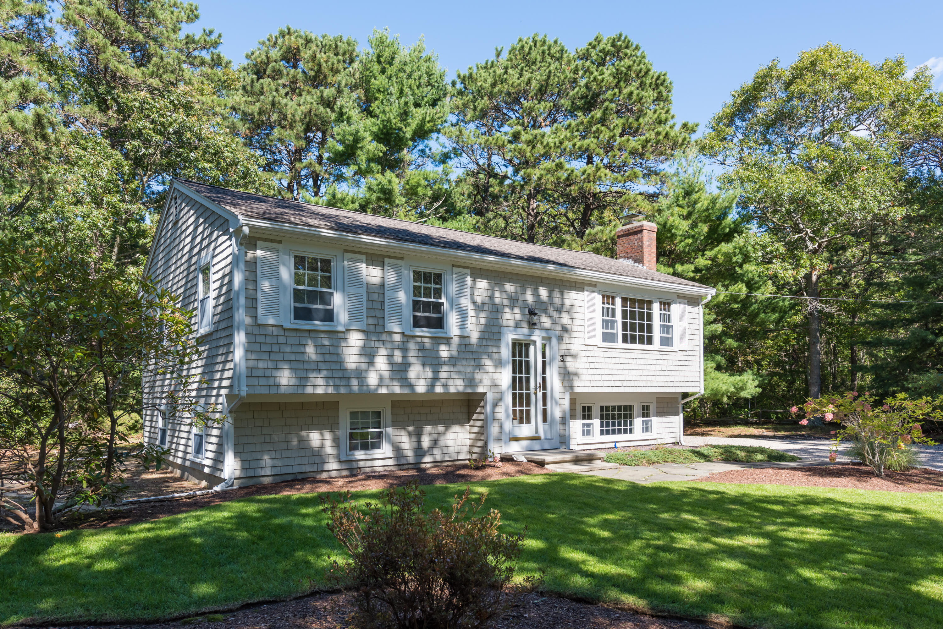 3 Neshobe Road Mashpee, MA 02649 - Photo 5 of 36 a view of a house with a yard