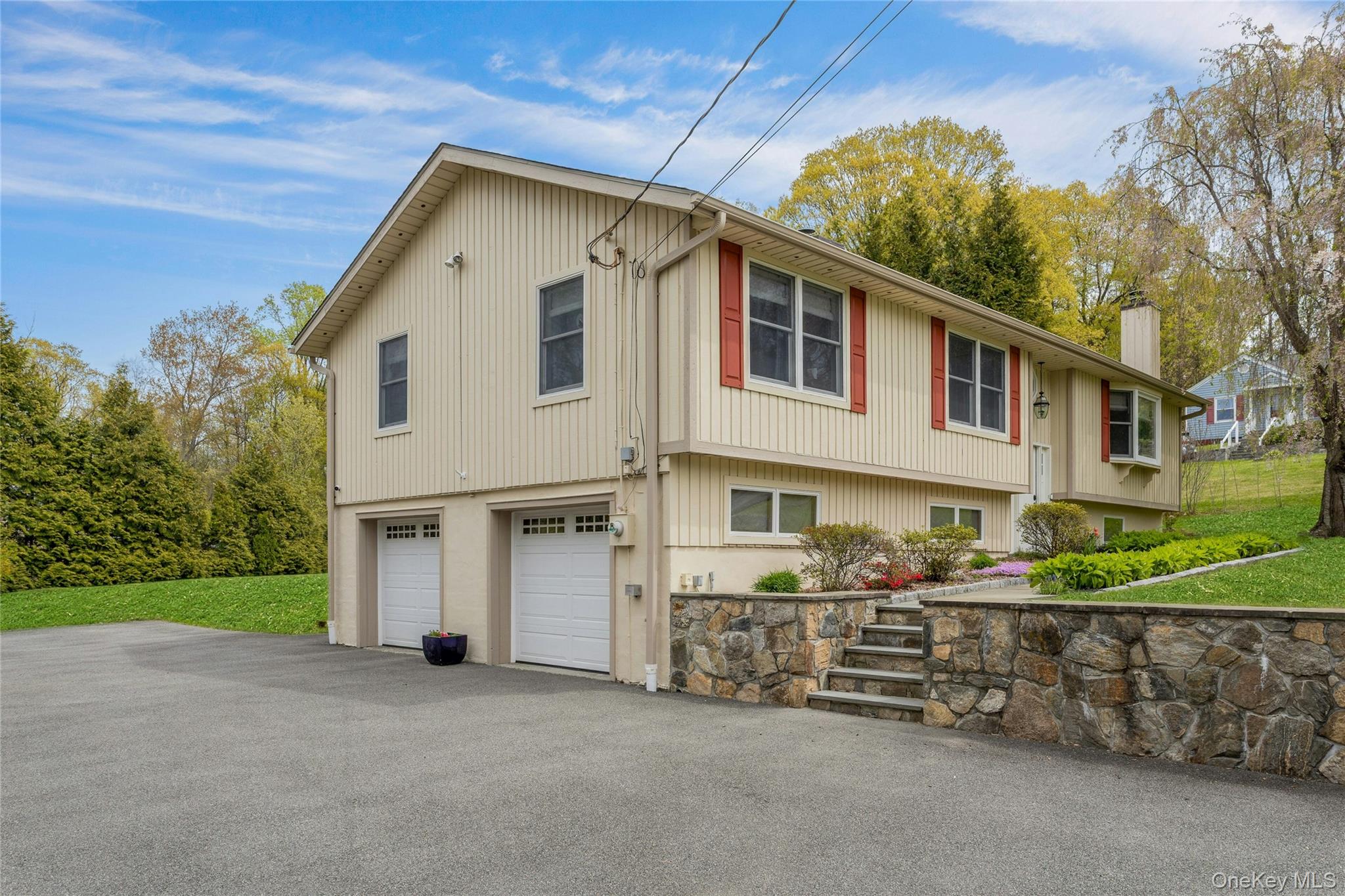 340 Osceola Road Jefferson Valley, NY 10535 - Photo 5 of 48 a view of a house with a yard