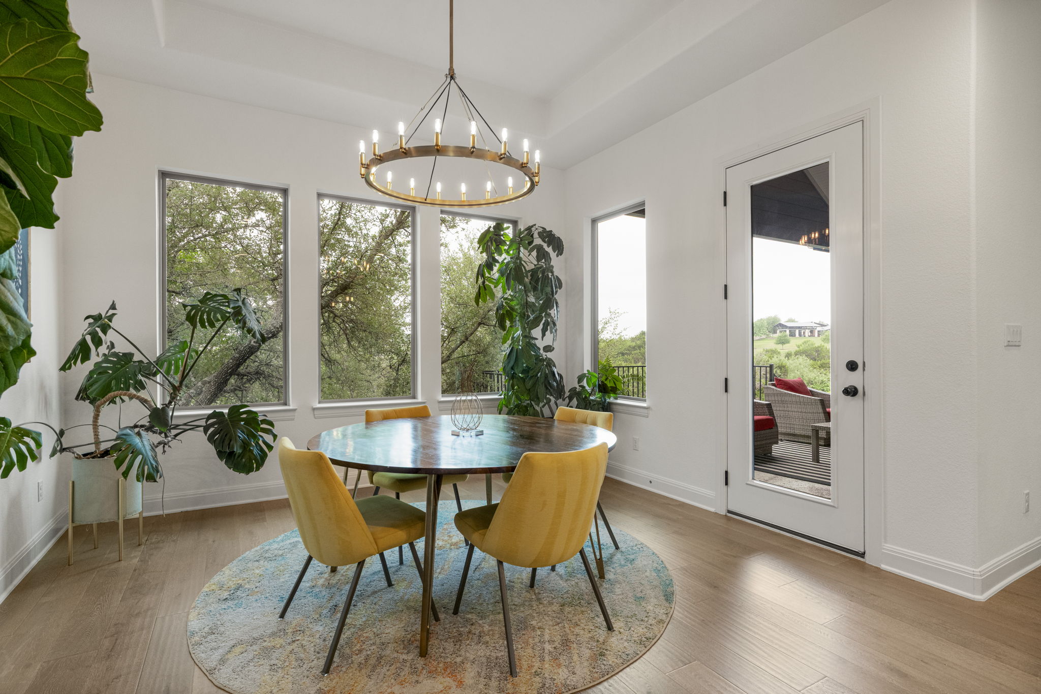 288 Hazy Hills Loop Dripping Springs, TX 78620 - Photo 7 of 40 A casual dining area positioned to capture natural light and views of the backyard alongside the gourmet kitchen.