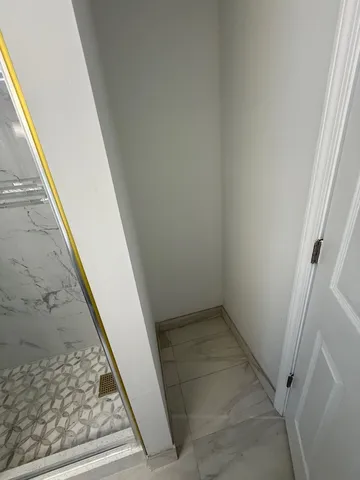 a view of hallway with stairs