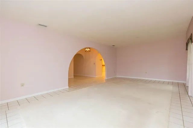 a spacious bathroom with a granite countertop sink mirror and double