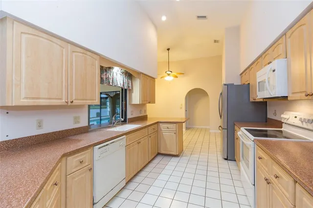 a view of a swimming pool with a porch