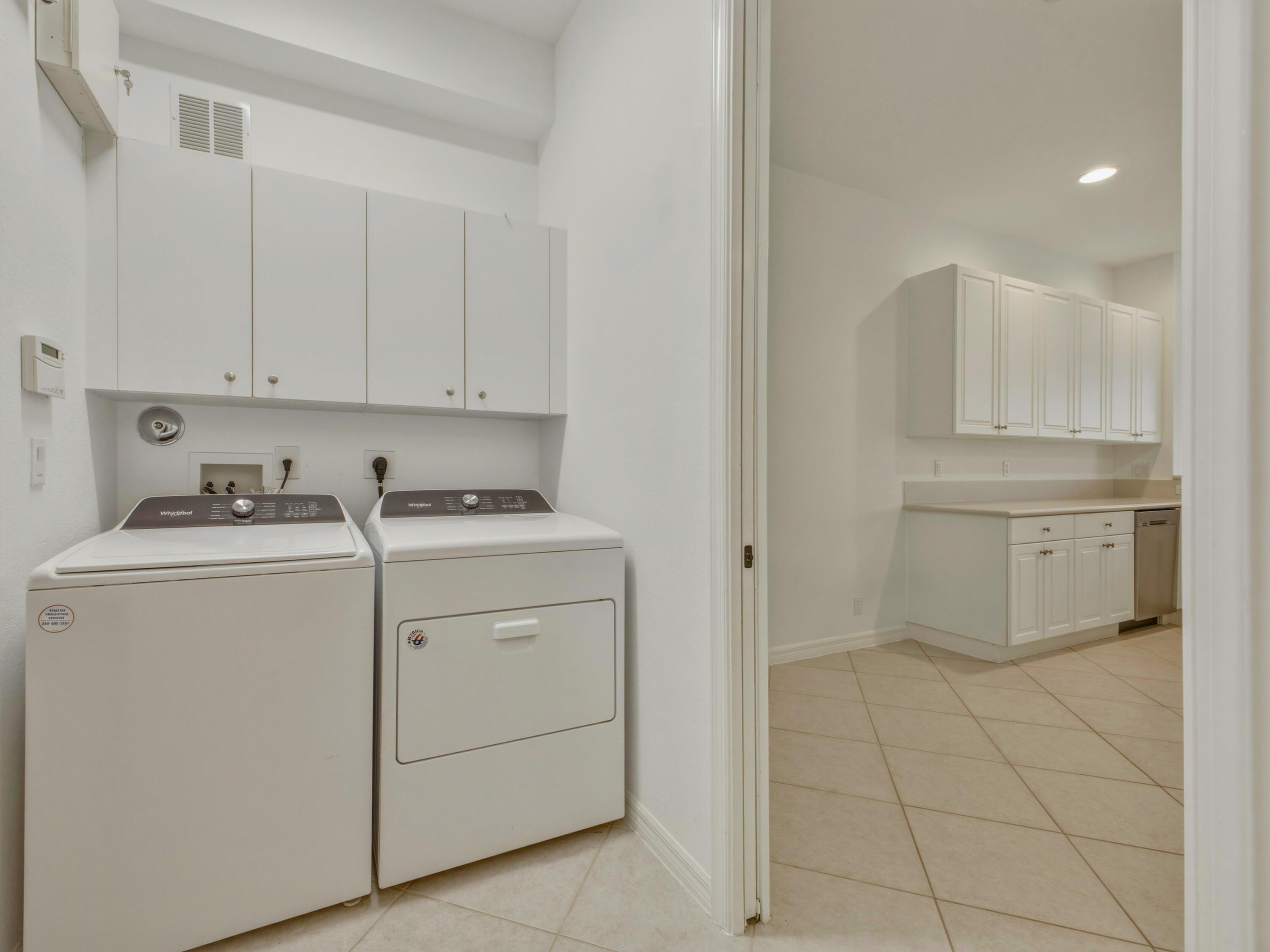 119 Lancaster Road Boynton Beach, FL 33426 - Photo 18 of 57 Laundry to Kitchen