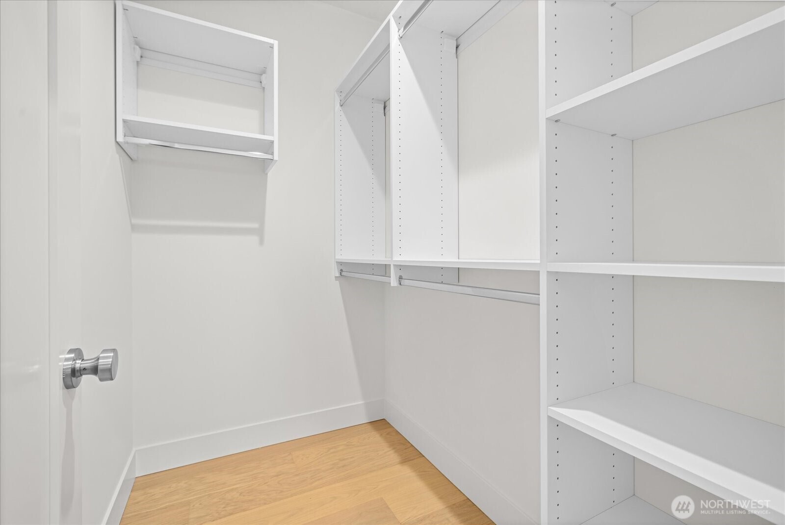 3407 Northwest 57th Street Seattle, WA 98107 - Photo 17 of 29 a view of a room with racks on the wall