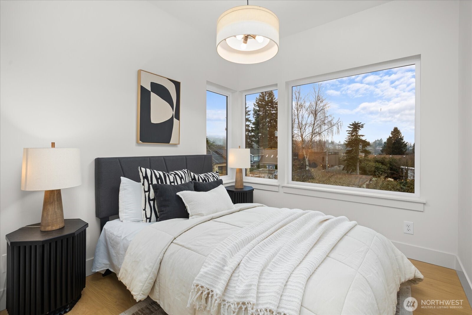 3407 Northwest 57th Street Seattle, WA 98107 - Photo 18 of 29 a bedroom with a large bed and a window