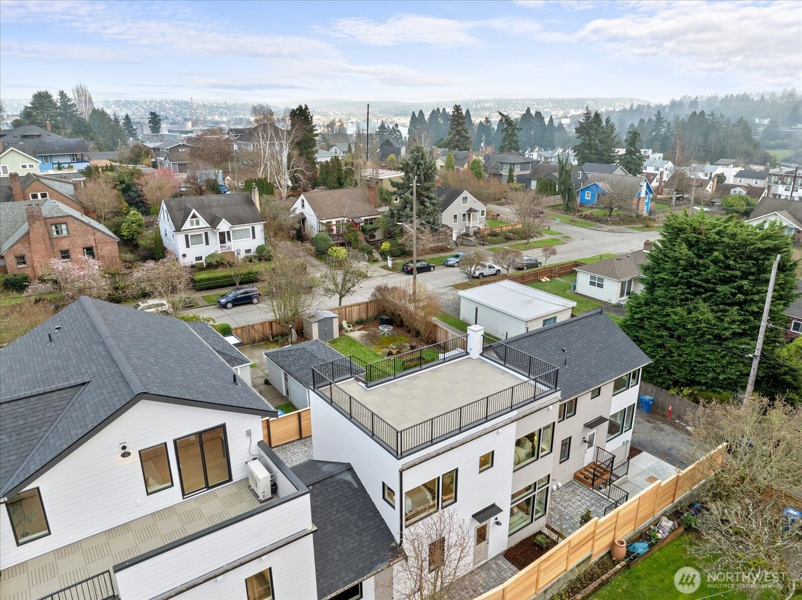 3407 Northwest 57th Street Seattle, WA 98107 - Photo 2 of 29 an aerial view of multiple houses with yard
