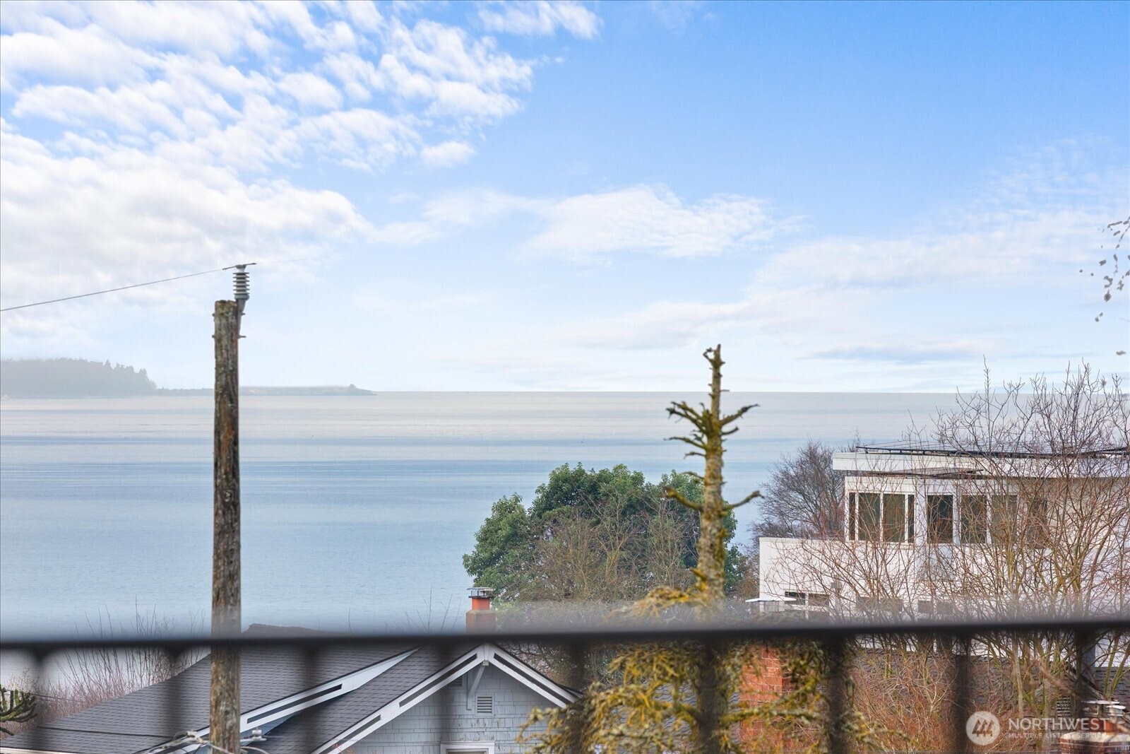 3407 Northwest 57th Street Seattle, WA 98107 - Photo 4 of 29 a view of a lake from a balcony