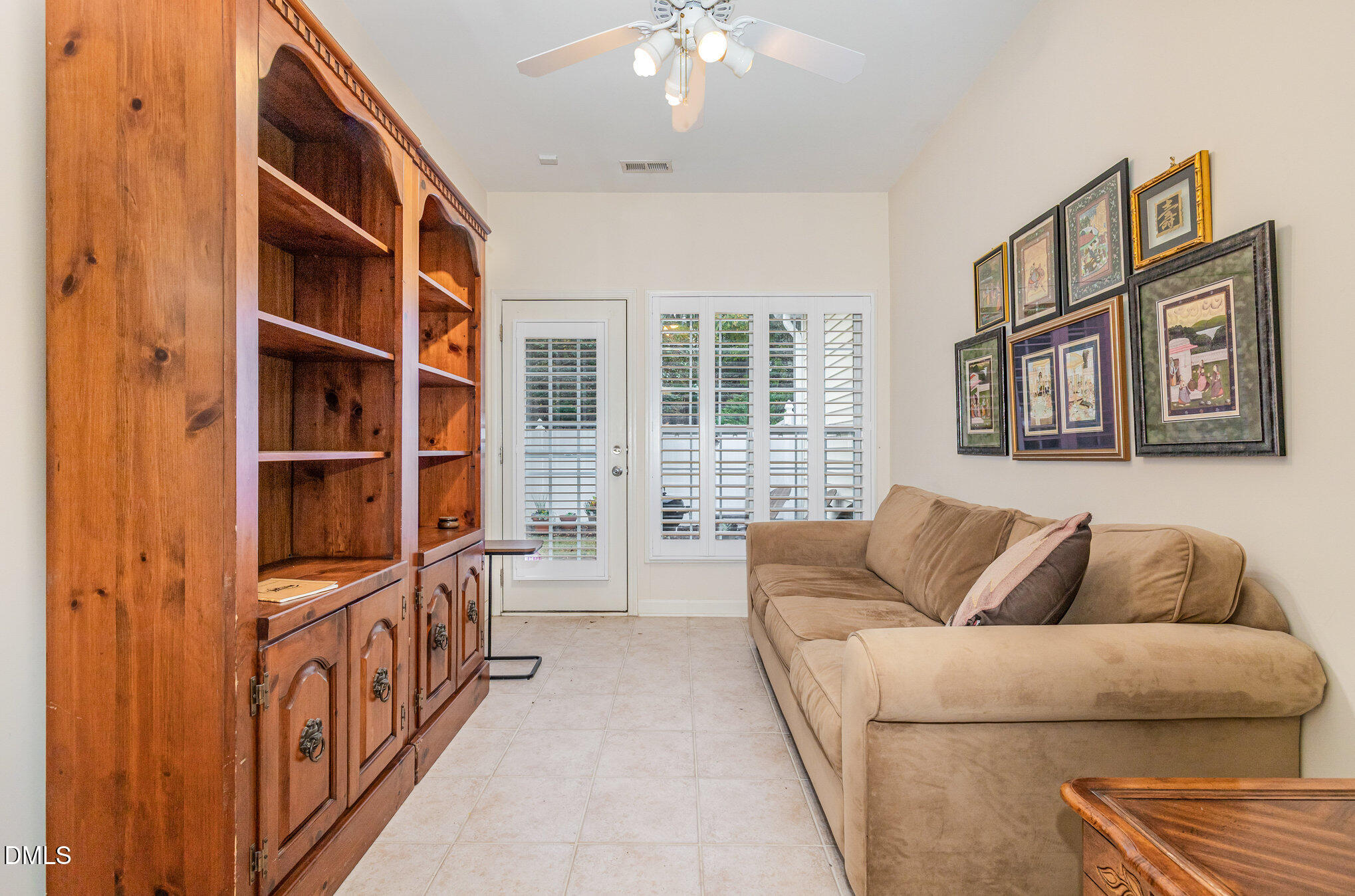 2541 Forest Shadows Lane Raleigh, NC 27614 - Photo 12 of 23 a living room with furniture and a large window