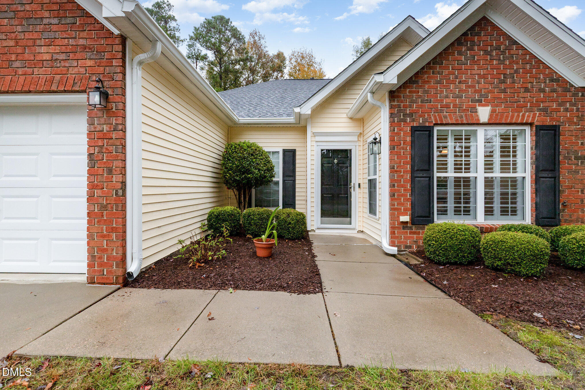 2541 Forest Shadows Lane Raleigh, NC 27614 - Photo 2 of 23 a front view of a house with garden