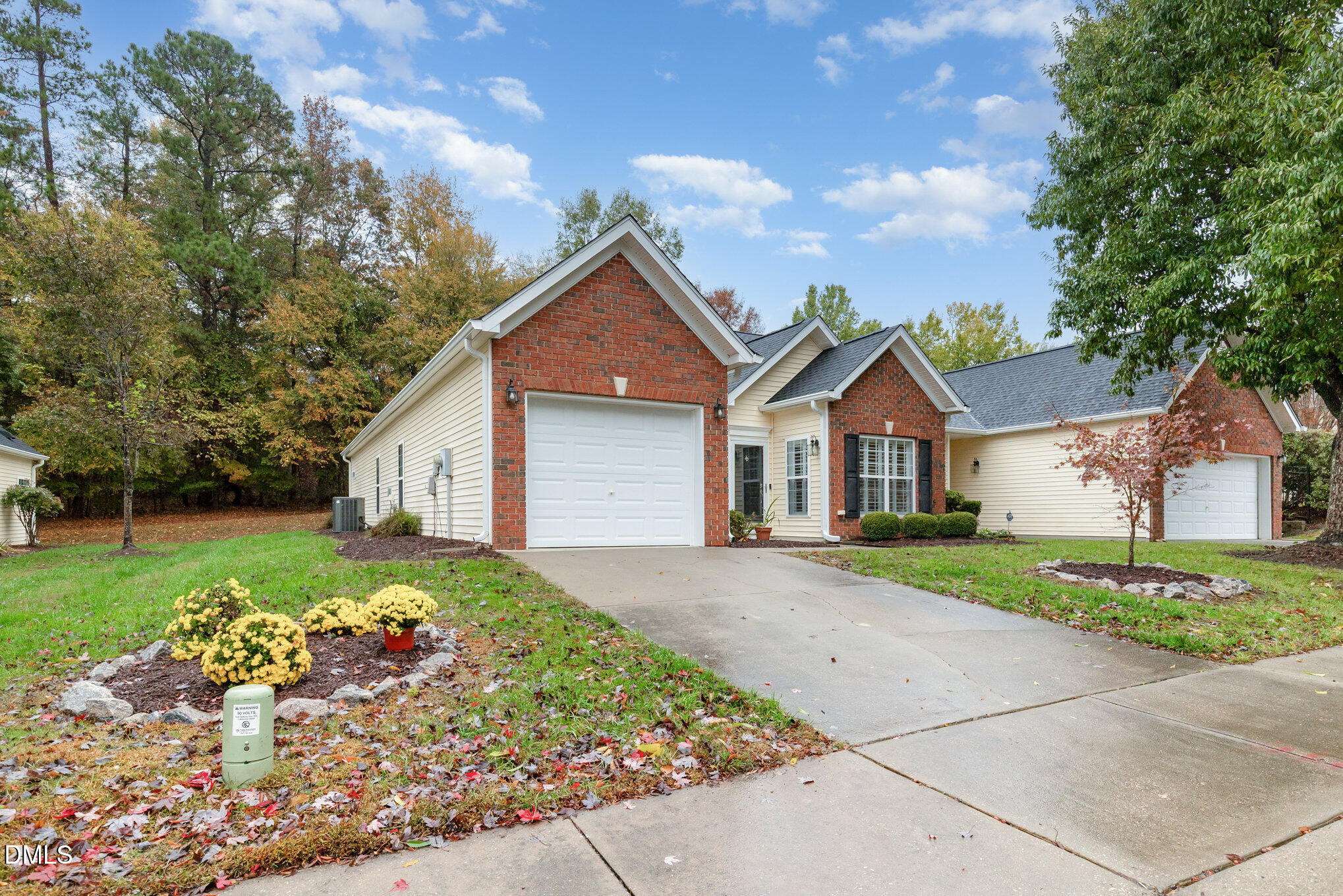 2541 Forest Shadows Lane Raleigh, NC 27614 - Photo 23 of 23 a front view of a house with a yard and garage