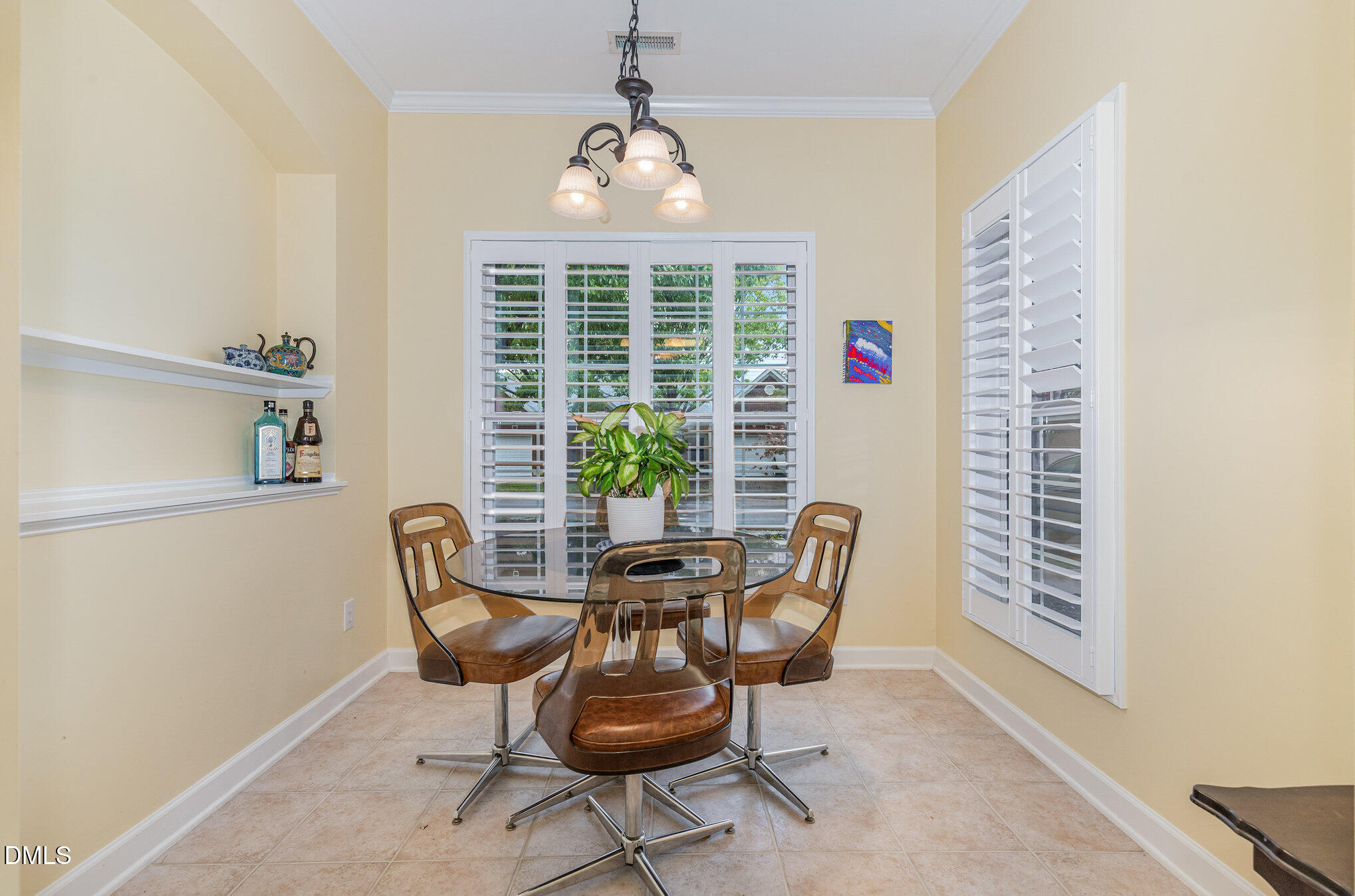 2541 Forest Shadows Lane Raleigh, NC 27614 - Photo 7 of 23 a dining room with furniture and window