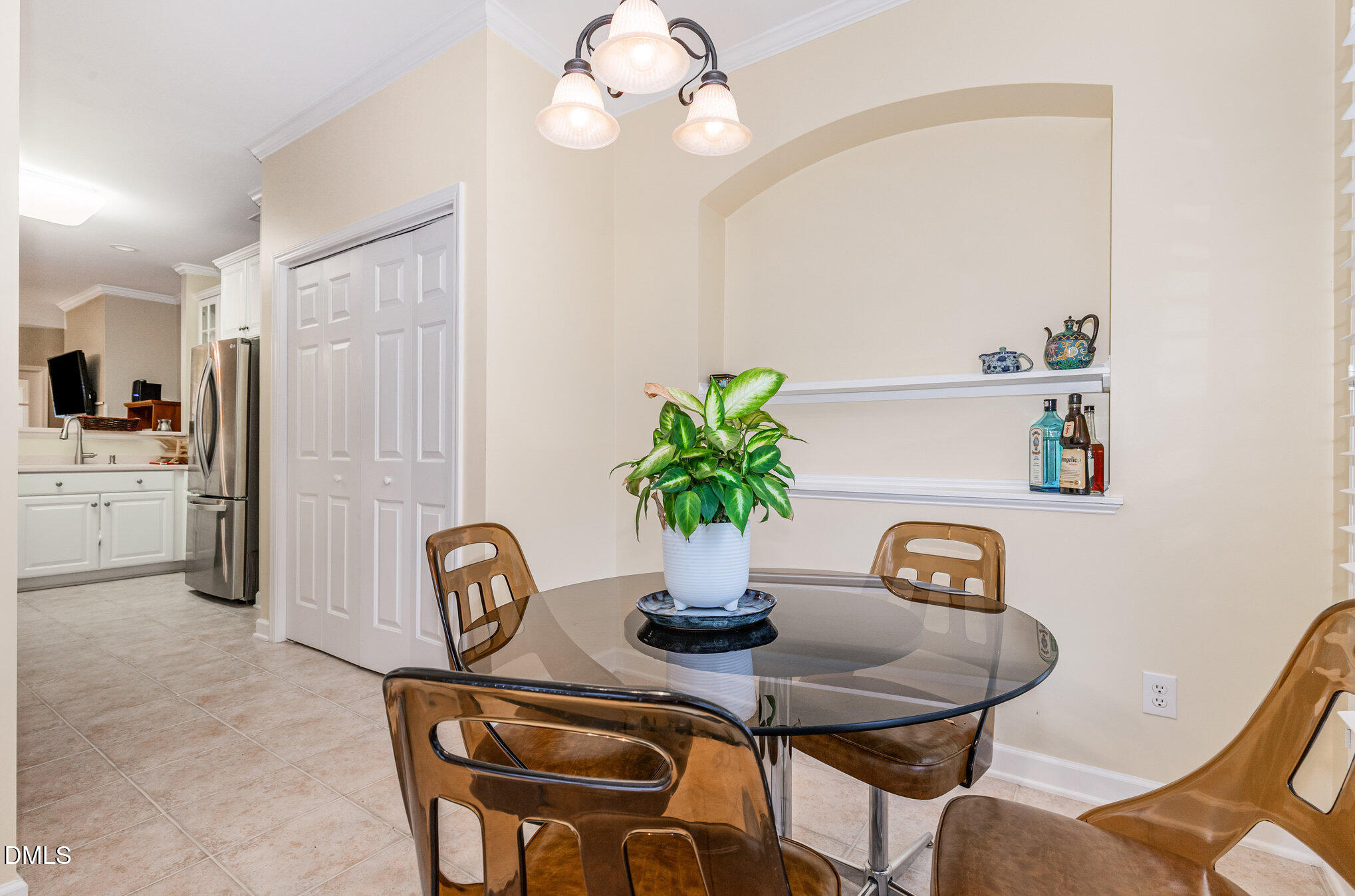 2541 Forest Shadows Lane Raleigh, NC 27614 - Photo 8 of 23 a view of a dining room with furniture and chandelier