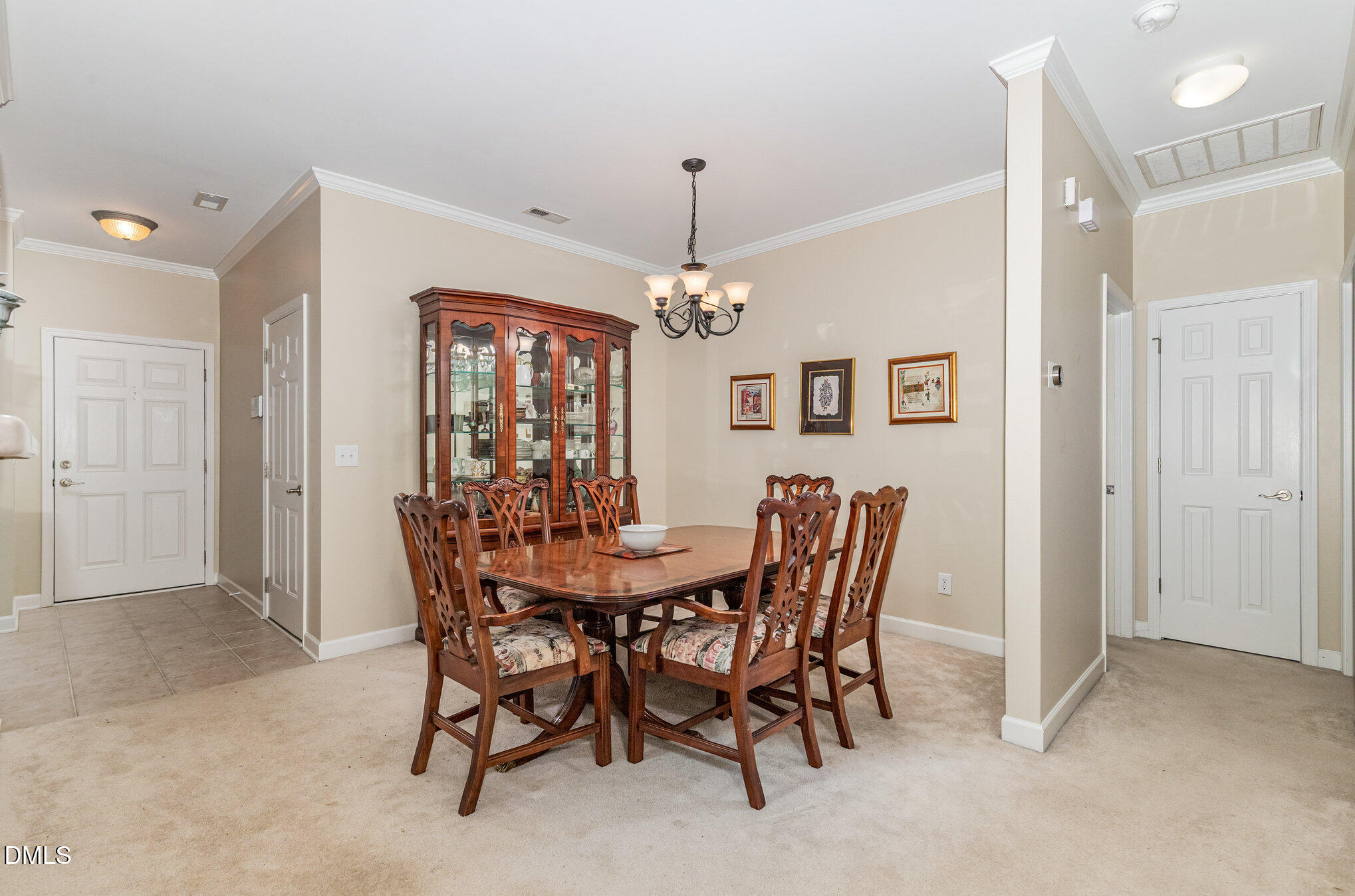 2541 Forest Shadows Lane Raleigh, NC 27614 - Photo 10 of 23 a view of a dining room with furniture window and wooden floor
