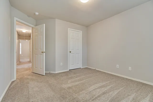 a view of a backyard with sitting area