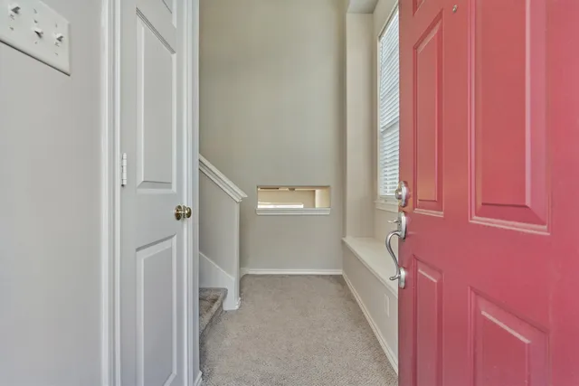a bathroom with a tub shower and a sink