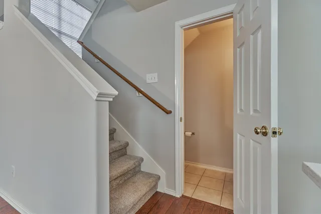 a bathroom with a sink a mirror and vanity
